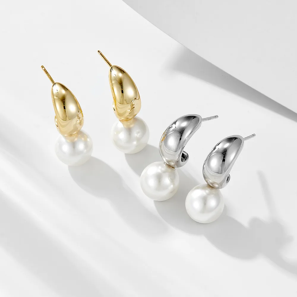Gold and silver drop earrings with round pearl accents, modern 925 sterling silver jewelry for a refined look.