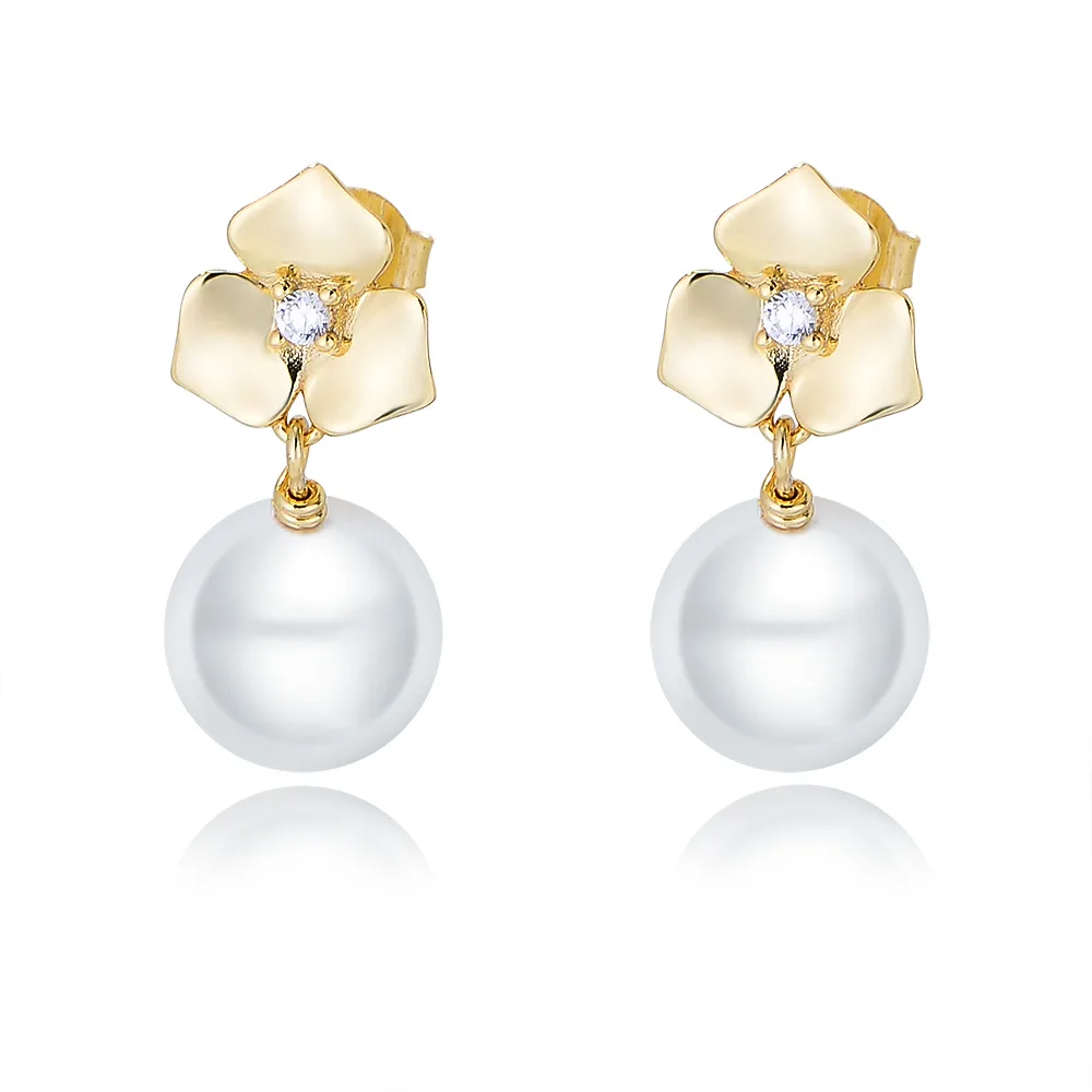 Gold flower petal pearl earrings with cubic zirconia center, romantic and elegant handcrafted jewelry.