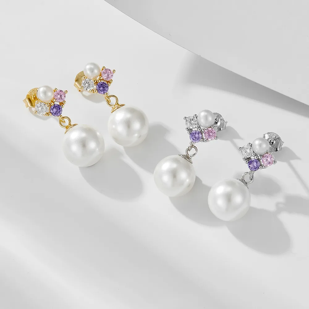 Pearl drop earrings in gold and silver tones with pink and purple gemstones, elegant handcrafted 925 silver jewelry.