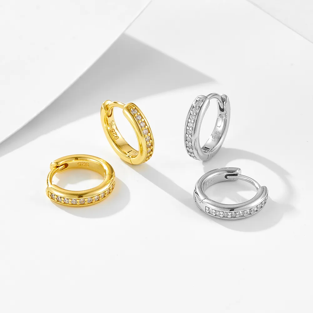 Gold and silver hoop earrings with cubic zirconia, minimalist everyday jewelry handcrafted in 925 sterling silver.
