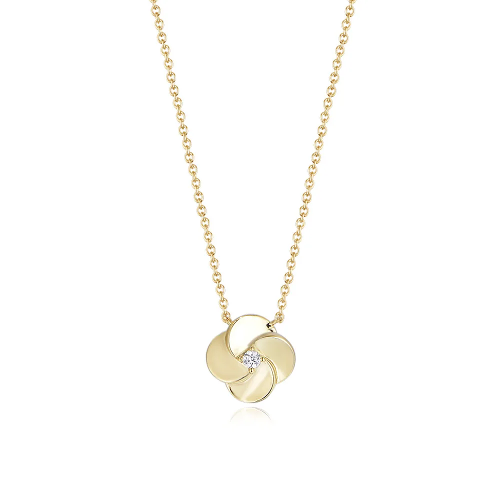 Gold flower swirl pendant necklace with cubic zirconia centerpiece, modern floral jewelry by Dorji Jewelry.