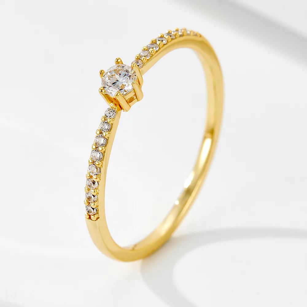 Solitaire CZ engagement-style ring with pavé band, crafted in 925 sterling silver for timeless elegance.