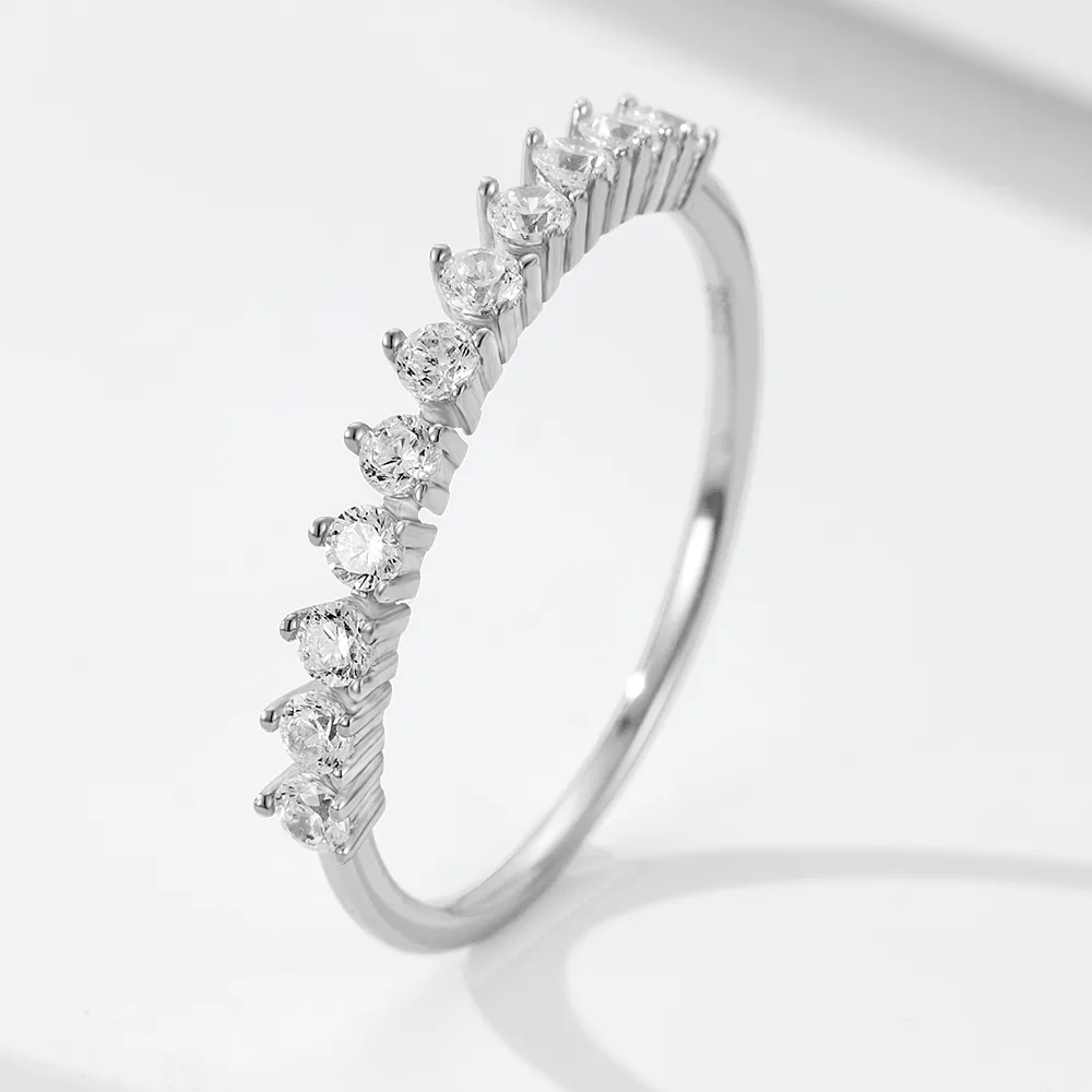 Sterling silver graduated CZ ring featuring a row of ascending round-cut stones, minimalist and elegant stacking jewelry.