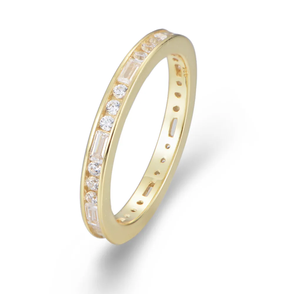 Gold channel-set eternity ring with alternating baguette and round cubic zirconia stones, crafted in 925 sterling silver.